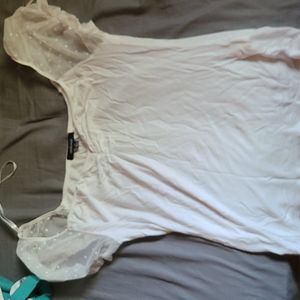 Net top with sheer sleeves